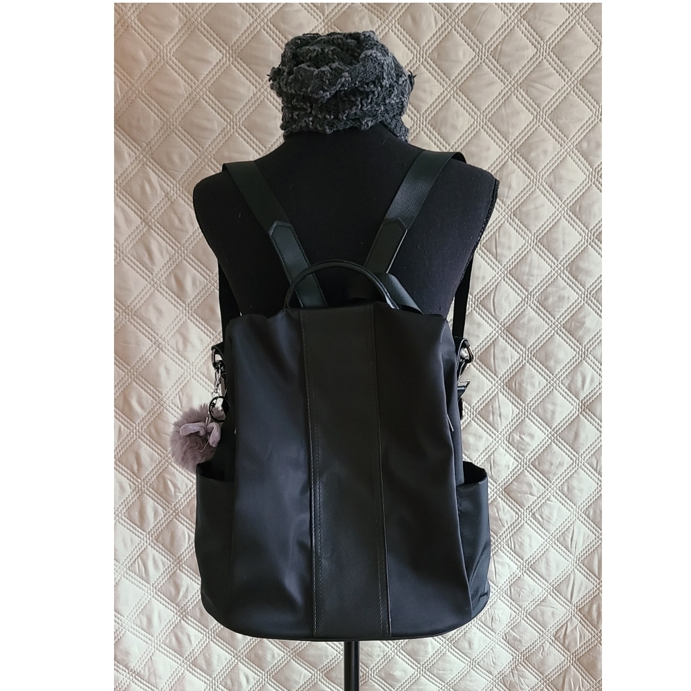 Sleek Black Tactical Backpack with Durable Design